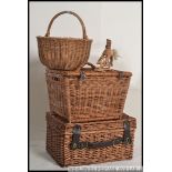 A collection of whicker hampers and baskets from the 20th century together with a wooden miniature