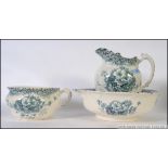 A late 19th early 20th Staffordshire wash bowl and matching jug set along with a bed pan,