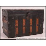 A fabulous 19th century american steamer trunk within canvas and wooden bindings having makers