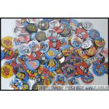 A collection of retro pin badges all pertaining to music to include artists such as X-Ray Spex,