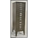 A vintage / retro industrial painted metal office 15 drawer filing cabinet of pedestal form with