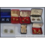 A collection of six sets of cased gentlemans cuff - links and tie pins to include Thomas Nash,