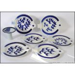 A collection of Scandinavian blue and white fish plates by Arabia being stamped to verso W30cm