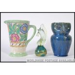 An unusual signed Deby jug in the form of an owl together with a Mdina art glass sculpture and an