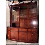 A large Regency style bookcase cabinet upright sideboard by Beresford and Hicks.