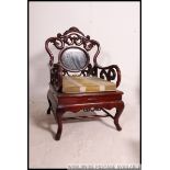A 20th century Chinese hardwood and marble armchairs / elbow chairs.