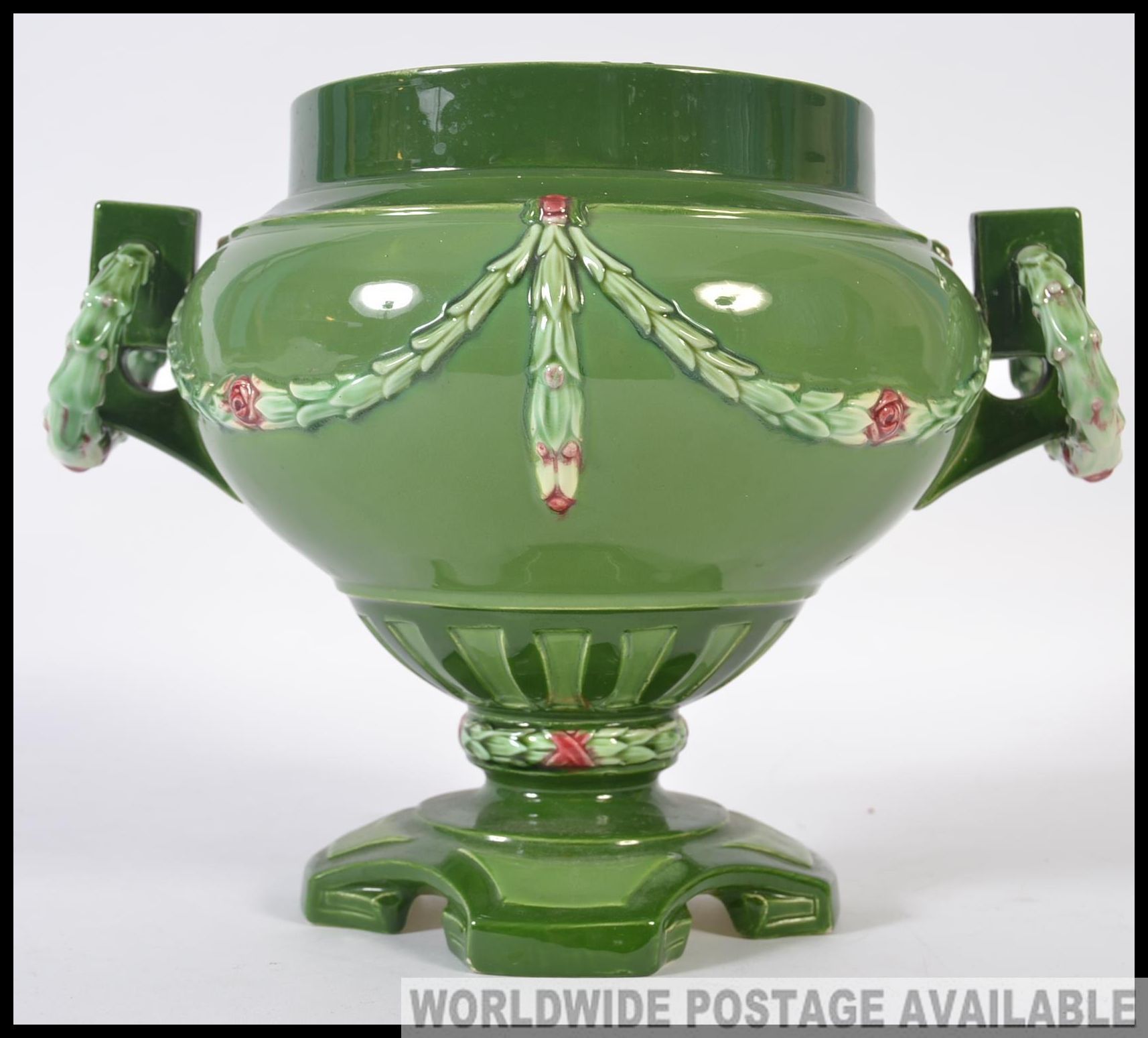 An early 20th century Austrian eichwald secessionist vase having green glaze with embellishments