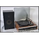 A retro 1970's record deck by Marconiphone model Unit 3 together with a single Marantz speaker