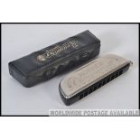A vintage Hohner Chrometta 10 harmonica NR253 complete in the case in excellent condition