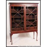 A 19th century mahogany bookcase on stand cabinet.