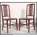 2 Edwardian mahogany marquetry inlaid bedroom / salon chairs being raised on tapered legs with