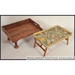 A good quality teak wood bedside tray table together with a vintage retro cabinet.