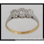 An 18ct gold and platinum vintage ladies diamond ring.