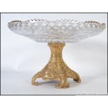 A continental cut glass and gilt metal based taza fruit bowl.