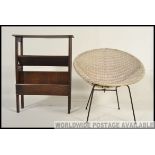 A retro weave atomic 1960's bedroom chair together with a vintage oak book trough bookcase cabinet