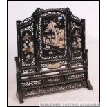 A 19th century mother of pearl and ebony Chinese screen / discretion panel.