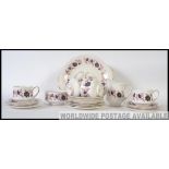 A 20th century Chintz pattern part tea service by Paragon.