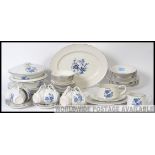A Wedgwood blue and white royal blue ironstone dinner and tea service comprising cups, saucers,