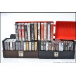 A collection of retro cassette tapes, all pertaining to Paul McCartney, The Beatles and Bon Jovi,