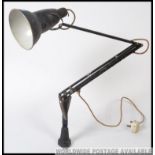 An early Herbert Terry bench mounted industrial workers anglepoise lamp, with original crabtree top.