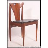 A set of 4 retro 1970's teak wood and black vinyl upholstered dining chairs with fabulous angular