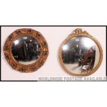 2 vintage 20th century convex wall mirrors of oval form,
