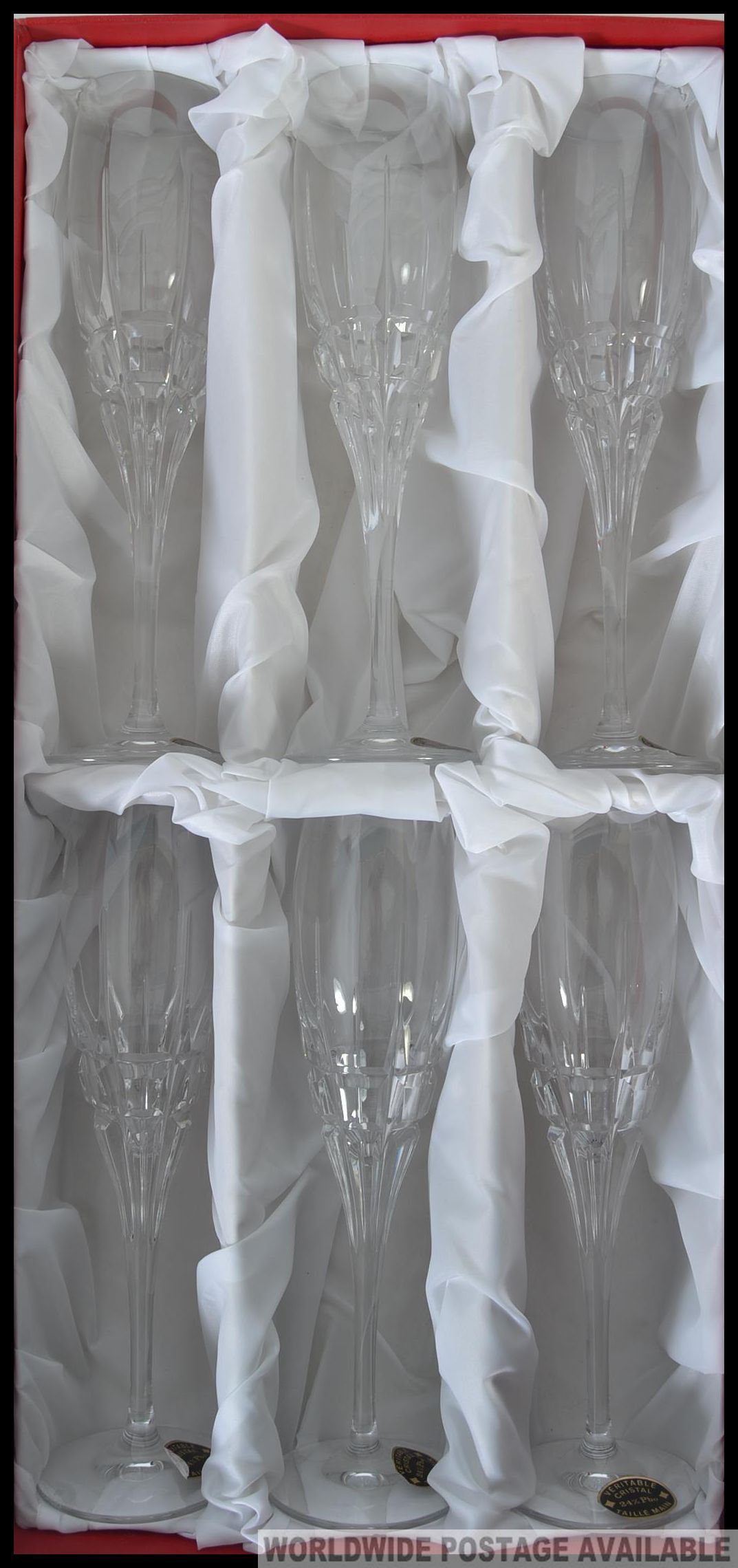 A set of ' Cristal ' crystal champagne flutes. Within the original lined presentation box. - Image 4 of 4