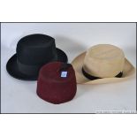 A vintage 20th century Fez together with a gentlemans bowler / fedora hat