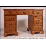 A good quality pine 20th century twin pedestal writing desk.