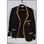 A vintage early 20th century school's / sports blazer having gold and black piping to the hem's,