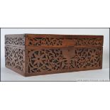 A 19th century Victorian lattice worked mahogany ladies workbox / jewellery box having hinged top