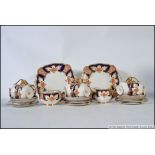 A Royal Albert ' Royalty ' pattern part tea service comprising cups, saucers, plates, sugar bowl,