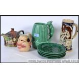 Four green majolica plates, Sylvac squirrel jug,