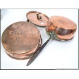 2 Victorian large copper saucepans.