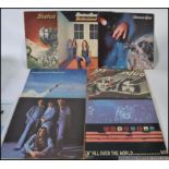 A collection f seven Status Quo vinyl music albums to include Status Quo, On The Level,