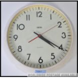 A vintage retro 20th century industrial Smiths quartz circular factory / school wall clock