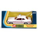 CORGI: An original vintage Corgi 402 Ford Cortina Police Car diecast model - within the original