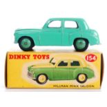 DINKY: An original vintage Dinky Toys 154 Hillman Minx Saloon diecast model car.