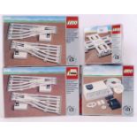 LEGO: A collection of vintage Lego railway trainset boxed accessories to include 7856 Points,