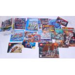 LEGO: A collection of 30+ vintage and assorted Lego set instructions and booklets.