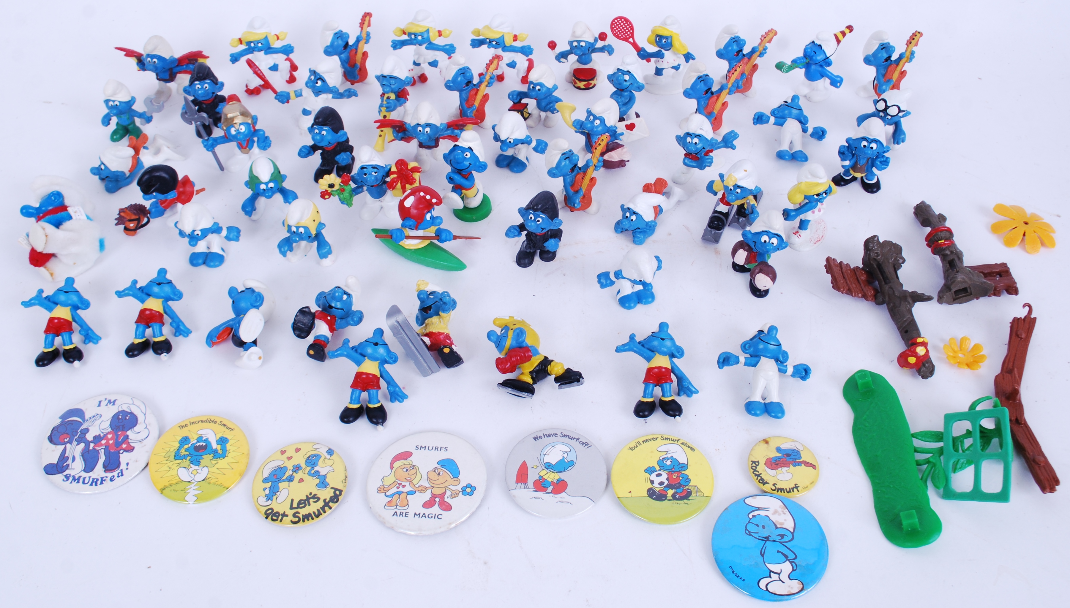 SMURFS: A good collection of 50x assorted vintage original Peyo Smurfs from the 1980's,