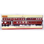HORNBY CALEDONIAN COACHES: A boxed collection set of Hornby 00 gauge railway trainset ' Caledonian