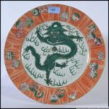 A Chinese charger / plate with central g