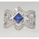 A 925 silver Art Deco crossover ring wit