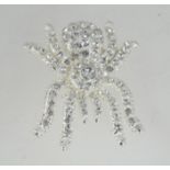A white metal spider tarantula brooch wi