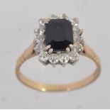 A hallmarked 9ct gold ring with central