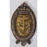 SILVER FOB MEDAL: A silver hallmarked military naval medal with anchor and lobster motif.