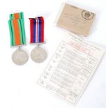 WWII MEDAL PAIR: A War and Victory medal, Second World War, issued to a W. Solomon of Cardiff.