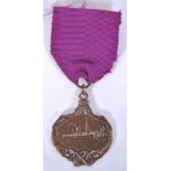 RMS CARPATHIA: A believed reproduction Bronze Titanic disaster RMS Carpathia medal and ribbon.