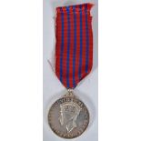 GEORGE MEDAL: A George Medal, likely silver but unmarked or untested. Lacking designers initials.